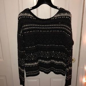 black, white, and gray sweater
